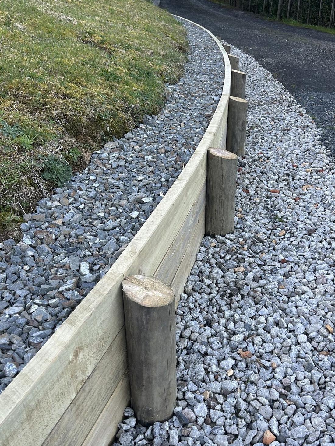 Curved timber retaining wall in Coatsville